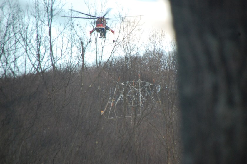 Tower construction 6:49 pm, March 23 bringing more material to tower shown in the previous photo
